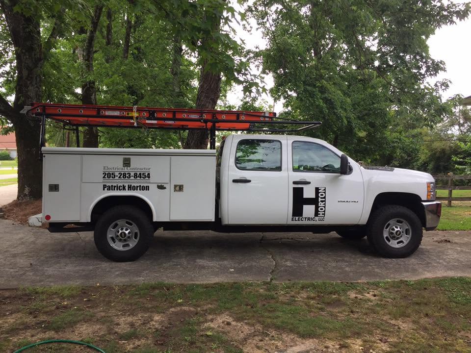 Horton Electric service truck with ladder rack, lettered with the Horton Electric logo and phone number